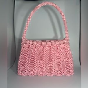 Pink draped beaded purse